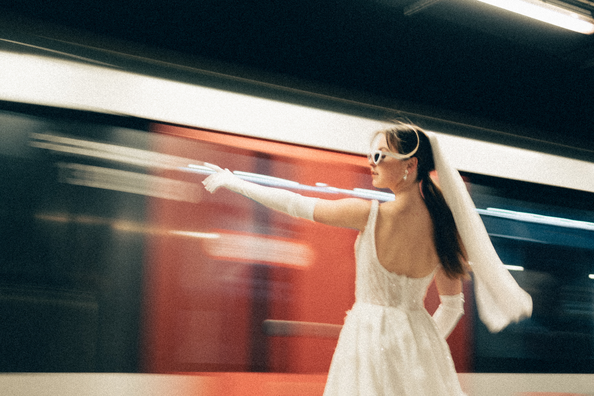 Bride in subway station in Amsterdam