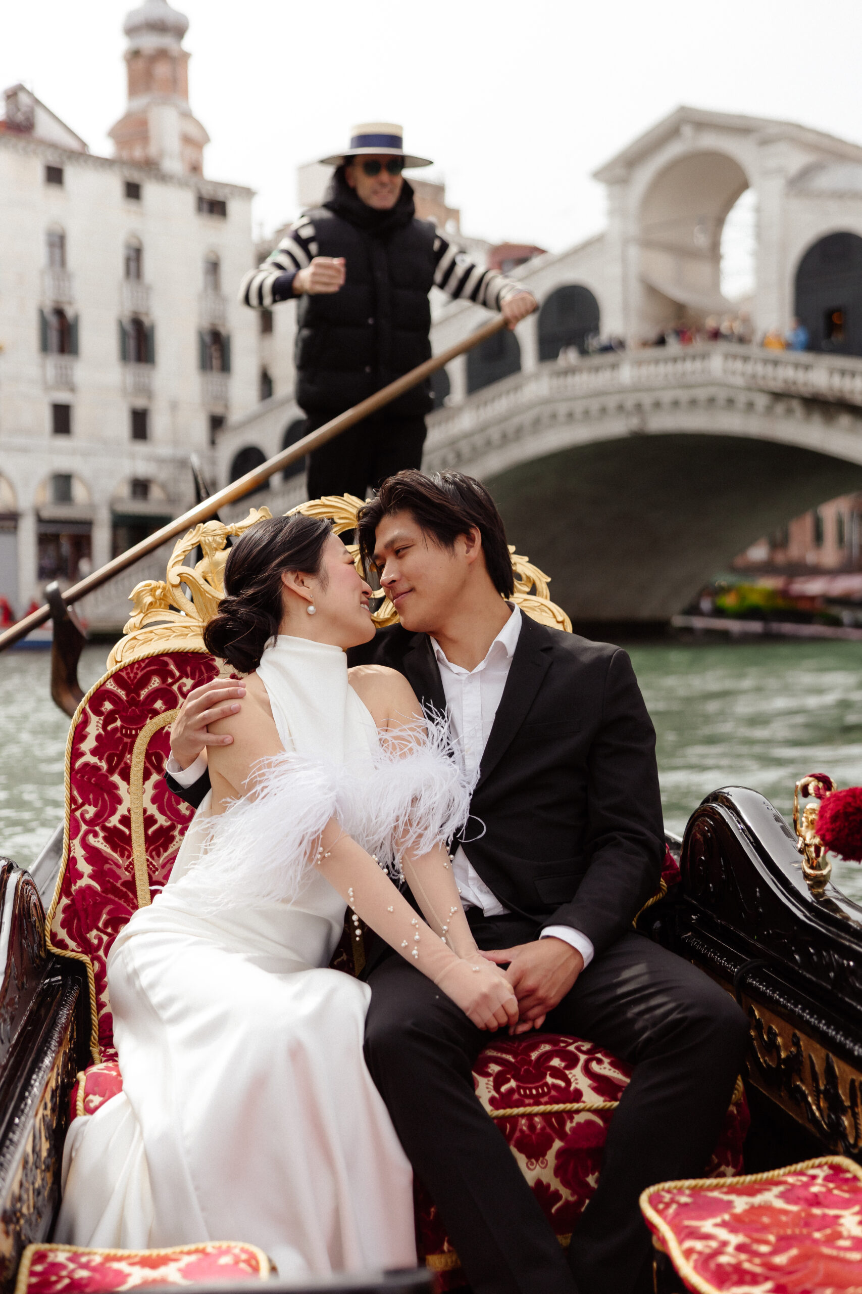 Bride and groom in Gondola in Venice on their Elopement